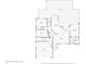 Layout of the first floor showing the kitchen, living room, bedrooms, bathrooms, and garage at 122 Colonial Se St, Port Charlotte, FL 33952