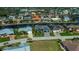 Aerial view of a beautifully landscaped community with waterfront homes at 1230 Royal Tern Dr, Punta Gorda, FL 33950