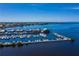 Scenic aerial view showcasing boats docked in a marina within a waterfront community at 1230 Royal Tern Dr, Punta Gorda, FL 33950