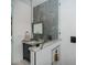 Chic bathroom with glass enclosed shower and floating vanity at 1230 Royal Tern Dr, Punta Gorda, FL 33950