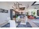 Dining room featuring modern design, an open floor plan and access to the kitchen and living spaces at 1230 Royal Tern Dr, Punta Gorda, FL 33950