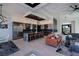 Open concept kitchen features bar seating, pendant lights, and stainless steel appliances at 1230 Royal Tern Dr, Punta Gorda, FL 33950