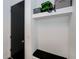Functional mudroom with built-in shelving and a convenient bench for storage and organization at 1230 Royal Tern Dr, Punta Gorda, FL 33950