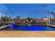 Beautiful pool area featuring waterfall feature, lush plantings and in-ground spa at 1230 Royal Tern Dr, Punta Gorda, FL 33950
