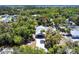Aerial view of the home showcasing lush surroundings at 16249 Ashland Ave, Port Charlotte, FL 33954