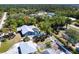 Aerial view of the house showing fenced back yard with the pool at 16249 Ashland Ave, Port Charlotte, FL 33954