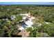 Drone view shows the backyard pool and the property's neighborhood at 16249 Ashland Ave, Port Charlotte, FL 33954