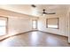 Bright bedroom with windows providing natural light and wood-look flooring at 16249 Ashland Ave, Port Charlotte, FL 33954