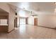 Bright and airy living room features tile flooring and sliding glass doors to the lanai at 16249 Ashland Ave, Port Charlotte, FL 33954