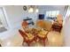 Cozy dining room adjacent to the living area with seating for four at 175 Kings Hwy # 736, Punta Gorda, FL 33983