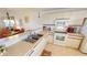 Kitchen with white cabinets, offering lots of countertop workspace at 175 Kings Hwy # 736, Punta Gorda, FL 33983