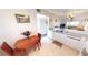 Kitchen adjacent to a dining table area and with access to another room at 175 Kings Hwy # 736, Punta Gorda, FL 33983