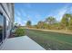 Sprawling backyard with lush green lawn, ideal for outdoor activities at 179 Boundary Blvd # 4, Rotonda West, FL 33947