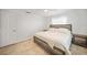 Comfortable bedroom with neutral color scheme, tiled floor, and ceiling fan at 1791 Belle Ct, Punta Gorda, FL 33950