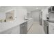 Modern kitchen with quartz countertops, stainless steel appliances, and an open design for easy entertaining at 1791 Belle Ct, Punta Gorda, FL 33950