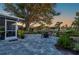 A comfortable outdoor dining space with a view of the waterway and boat docks at 18417 Ohara Dr, Port Charlotte, FL 33948