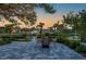 A lovely outdoor seating area with lush foliage and picturesque waterway views at 18417 Ohara Dr, Port Charlotte, FL 33948