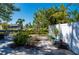 Outdoor space features water views, beautiful landscaping, and a paved walkway at 18417 Ohara Dr, Port Charlotte, FL 33948