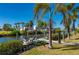 Inviting dock with comfortable seating, boat lift, and scenic water views, enhancing the waterfront experience at 18417 Ohara Dr, Port Charlotte, FL 33948