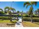 Waterfront dock with seating for relaxing and enjoying the beautiful canal views at 18417 Ohara Dr, Port Charlotte, FL 33948