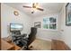 Office featuring a large black office chair, desk and a beach-themed picture on the television at 18417 Ohara Dr, Port Charlotte, FL 33948