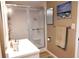 A clean bathroom featuring a glass shower door and a well-lit vanity at 21405 Olean Blvd # 308, Port Charlotte, FL 33952