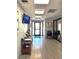 Modern lobby area with a TV, stylish decor, and comfortable seating for residents and guests at 21405 Olean Blvd # 308, Port Charlotte, FL 33952