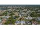 Aerial view of the property showcasing the home's setting in a residential neighborhood at 23051 Elmira Blvd, Punta Gorda, FL 33980