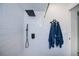 Modern bathroom shower with white subway tiles and matte black shower head and fixtures at 23051 Elmira Blvd, Punta Gorda, FL 33980