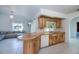 Butcher block counters highlight this kitchen that opens to living room and backyard at 23051 Elmira Blvd, Punta Gorda, FL 33980