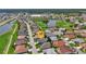 Bird's eye view of home in a well-kept neighborhood, close to the golf course, a lake, and various community amenities at 24055 Buckingham Way, Punta Gorda, FL 33980