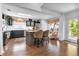 Beautiful kitchen with a central island, modern appliances, dark cabinets and views to the outdoor patio at 24055 Buckingham Way, Punta Gorda, FL 33980