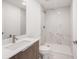 Contemporary bathroom with a walk-in shower, modern fixtures, and a spacious vanity at 24166 Colima Ct, Punta Gorda, FL 33955