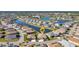 Aerial view of home in a community with lake and golf course, highlighted with location marker at 24371 Westgate Blvd, Port Charlotte, FL 33980