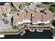 Waterfront townhomes with private boat docks on a canal surrounded by mature trees at 25188 Marion Ave # 1013, Punta Gorda, FL 33950