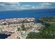 Waterfront community with boat docks and lush landscaping and a view of the ocean at 25188 Marion Ave # 1013, Punta Gorda, FL 33950