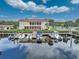 Community featuring boat docks and a nearby clubhouse with a pool and ample parking at 25188 Marion Ave # 1013, Punta Gorda, FL 33950