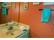 Cozy bathroom with a vanity, decorative accents, and bright lighting, offering a functional space at 25188 Marion Ave # 1013, Punta Gorda, FL 33950