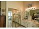 Modern bathroom features dual vanities and a separate toilet area at 25188 Marion Ave # 1013, Punta Gorda, FL 33950
