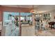 Well-lit dining room with adjacent living spaces, great for entertaining at 25188 Marion Ave # 1013, Punta Gorda, FL 33950