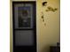 Up-close view of the home's front door with a decorative wreath, adding charm and personality to the entrance at 25188 Marion Ave # 1013, Punta Gorda, FL 33950