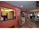 Open-concept living space offering seamless flow between the kitchen, dining, and living areas with modern flooring at 25188 Marion Ave # 1013, Punta Gorda, FL 33950