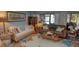 Comfortable living room with stylish decor and lots of natural light at 25188 Marion Ave # 1013, Punta Gorda, FL 33950