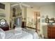 Bright bedroom features an open layout with decorative items and decor at 25188 Marion Ave # 1013, Punta Gorda, FL 33950