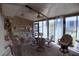 Enclosed patio with neutral tones featuring water view from the nearby windows at 25188 Marion Ave # 1013, Punta Gorda, FL 33950