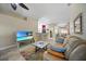 Bright living room with tile floors, bar area, and an open floor plan at 27002 Clear Creek Way, Punta Gorda, FL 33950