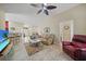 Welcoming living room featuring an open layout and neutral color palette at 27002 Clear Creek Way, Punta Gorda, FL 33950