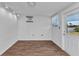 Room with wood floors, and window at 3243 Elkcam Blvd, Port Charlotte, FL 33952