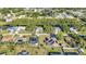 Picturesque neighborhood with beautiful tropical foliage, mature trees and well-kept lawns at 3880 Pinstar Ter, North Port, FL 34287