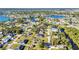 Scenic aerial shot of a neighborhood featuring beautiful waterways and picturesque homes at 3880 Pinstar Ter, North Port, FL 34287